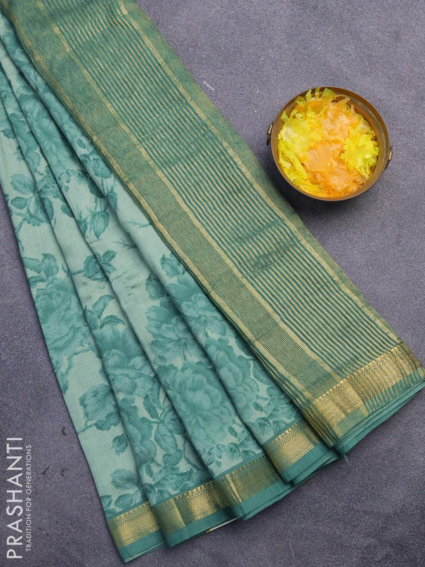 Malai silk saree pastel green and green shade with allover floral prints and zari woven border