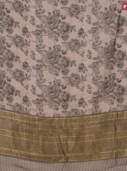 Malai silk saree grey shade and grey with allover floral prints and zari woven border