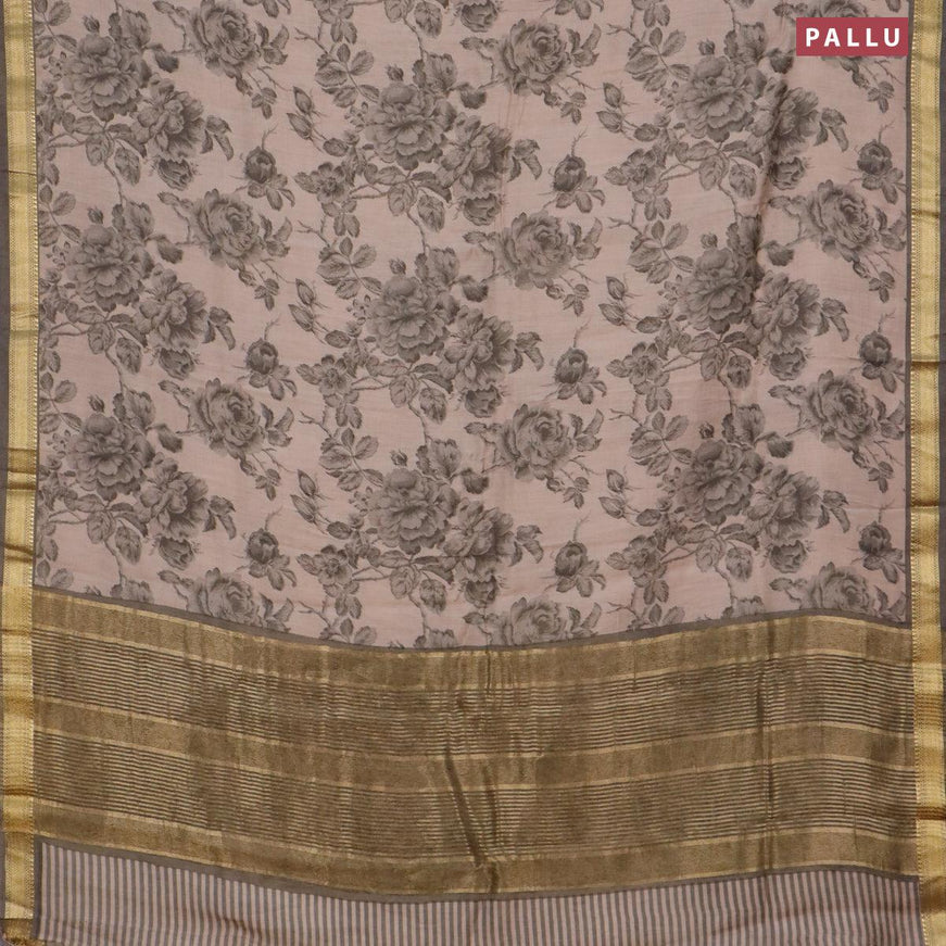 Malai silk saree grey shade and grey with allover floral prints and zari woven border