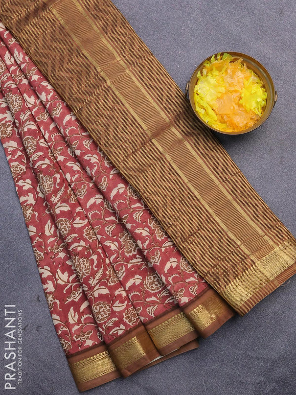 Malai silk saree pastel maroon and brown with allover prints and zari woven border