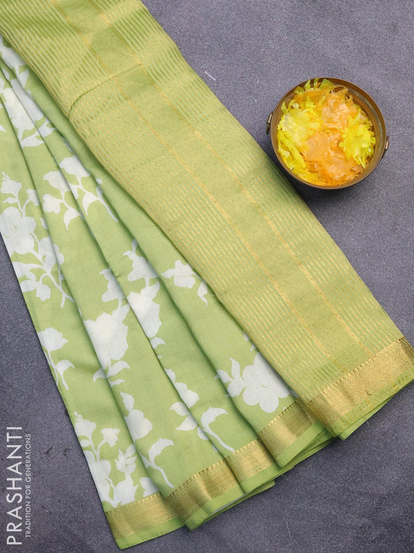 Malai silk saree pista green with allover floral prints and zari woven border