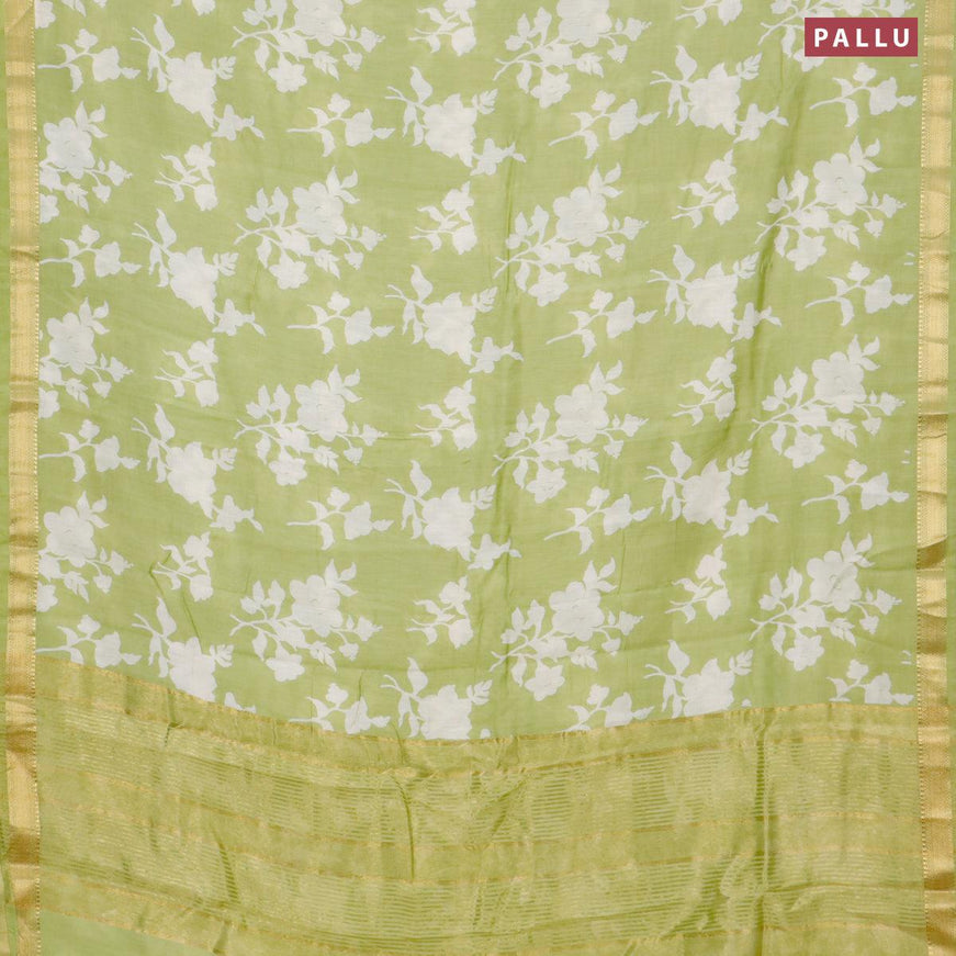 Malai silk saree pista green with allover floral prints and zari woven border