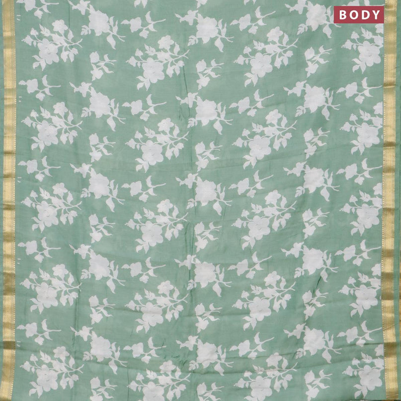 Malai silk saree pastel green with allover floral prints and zari woven border