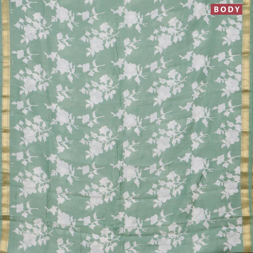 Malai silk saree pastel green with allover floral prints and zari woven border