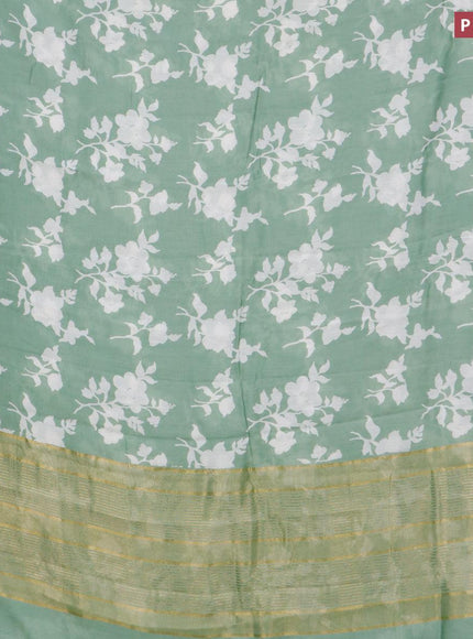 Malai silk saree pastel green with allover floral prints and zari woven border