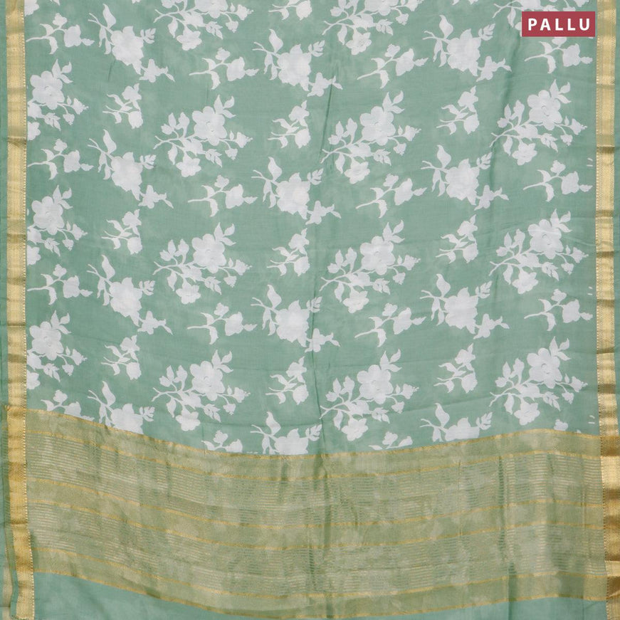 Malai silk saree pastel green with allover floral prints and zari woven border