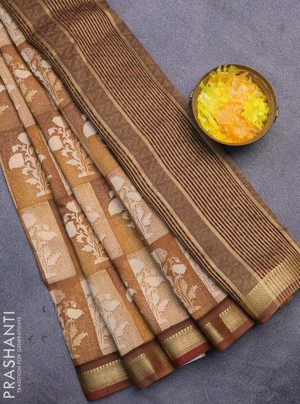 Malai silk saree beige mustard shade and dark mustard with allover prints and zari woven border