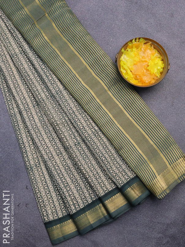 Malai silk saree beige and dark green shade with allover prints and zari woven border