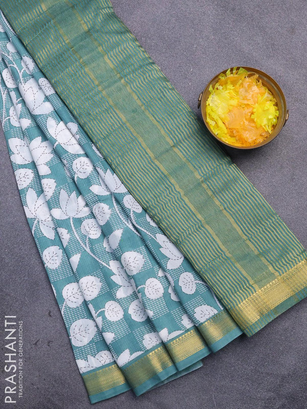 Malai silk saree pastel blue and off white with allover floral prints and zari woven border