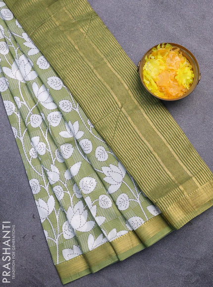 Malai silk saree green shade and off white with allover floral prints and zari woven border