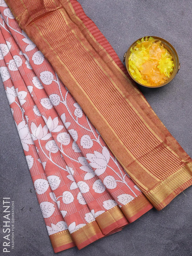 Malai silk saree pastel peach and off white with allover floral prints and zari woven border