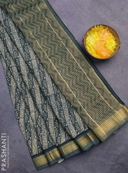 Malai silk saree green with allover prints and zari woven border