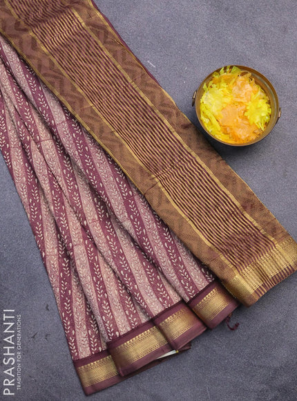 Malai silk saree pastel maroon shade with allover prints and zari woven border