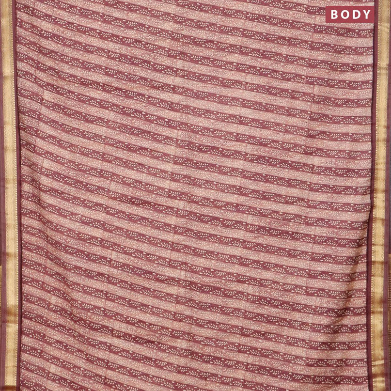 Malai silk saree pastel maroon shade with allover prints and zari woven border