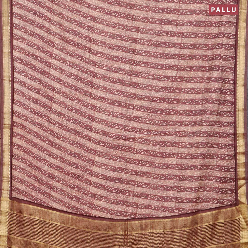 Malai silk saree pastel maroon shade with allover prints and zari woven border