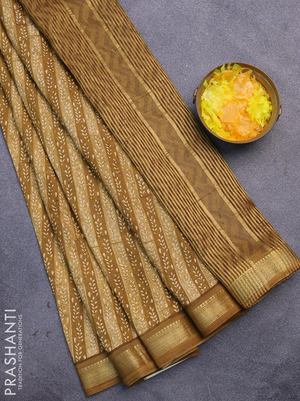 Malai silk saree mustard shade with allover prints and zari woven border