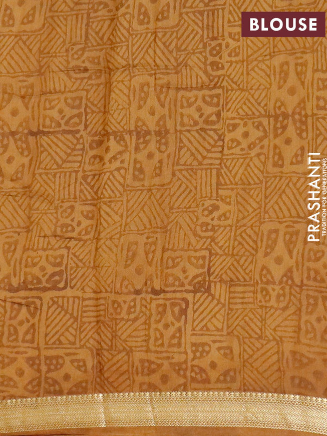 Malai silk saree mustard shade with allover prints and zari woven border