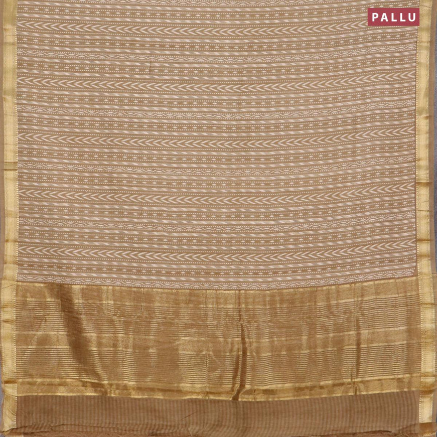 Malai silk saree khaki shade with allver ikat prints and zari woven border