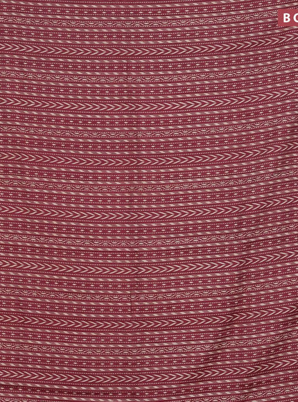 Malai silk saree maroon shade with allver ikat prints and zari woven border