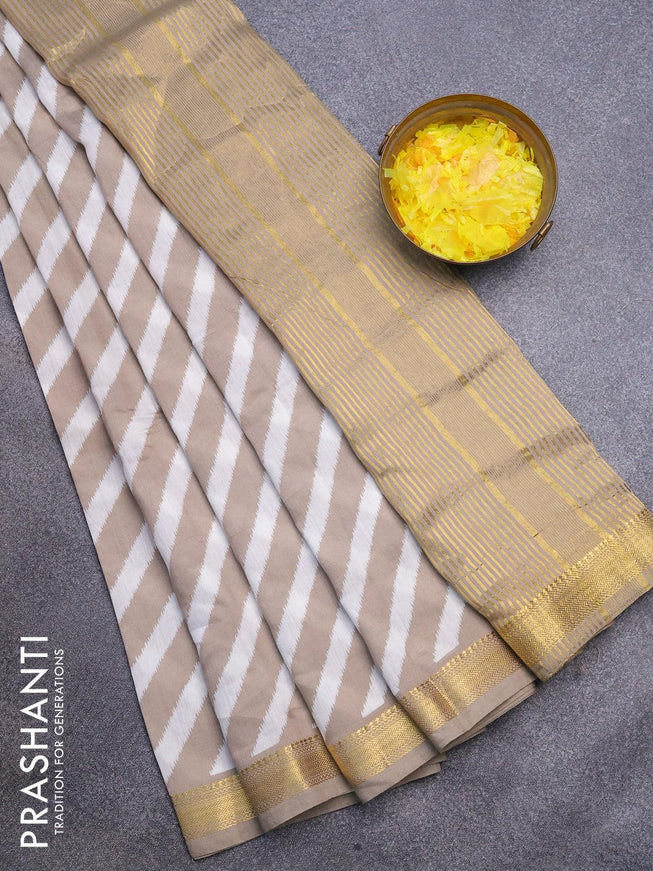 Malai silk saree off white and grey shade with allover leheriya prints and zari woven border