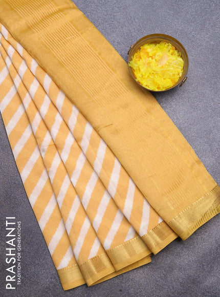 Malai silk saree off white and yellow shade with allover leheriya prints and zari woven border