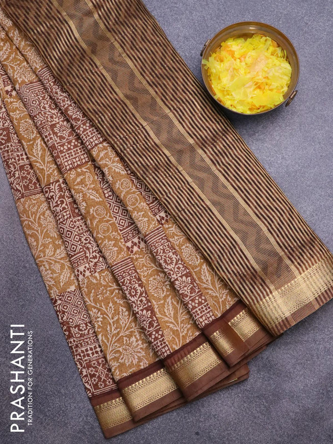 Malai silk saree khaki shade and brown with allover prints and zari woven border