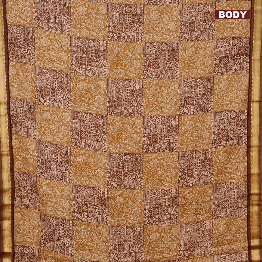 Malai silk saree khaki shade and brown with allover prints and zari woven border