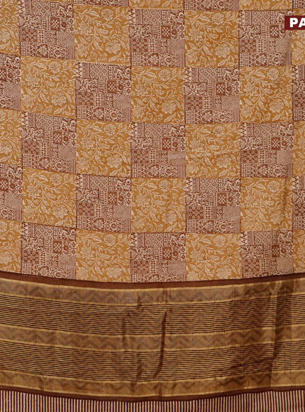 Malai silk saree khaki shade and brown with allover prints and zari woven border