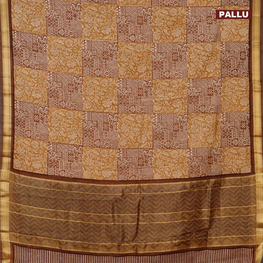 Malai silk saree khaki shade and brown with allover prints and zari woven border