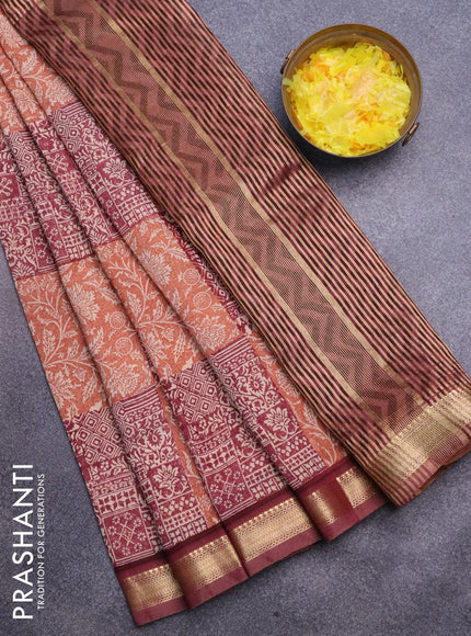 Malai silk saree rust shade and maroon with allover prints and zari woven border