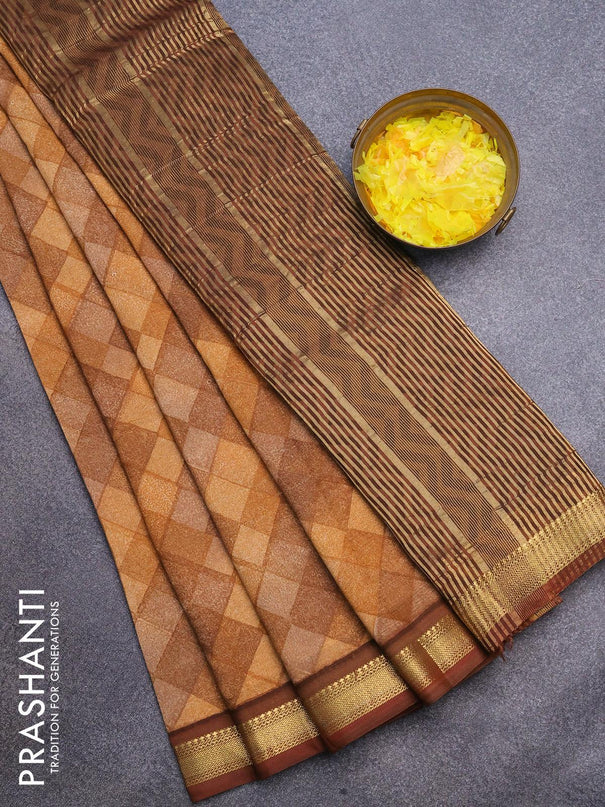 Malai silk saree dark mustard and rust shade with allover geometric prints and zari woven border