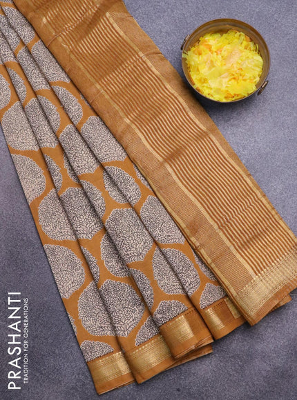 Malai silk saree dark mustard with allover butta prints and zari woven border