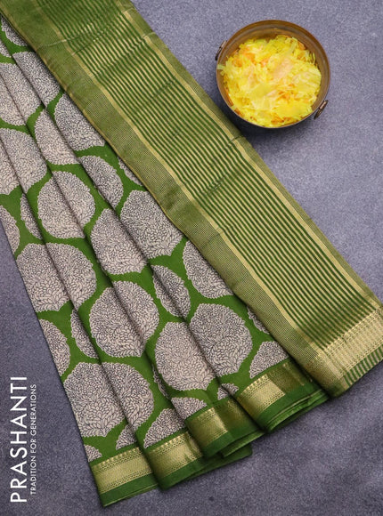 Malai silk saree green with allover butta prints and zari woven border