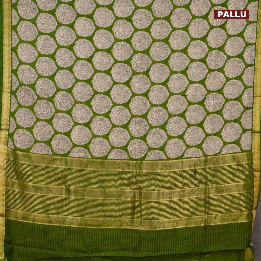 Malai silk saree green with allover butta prints and zari woven border