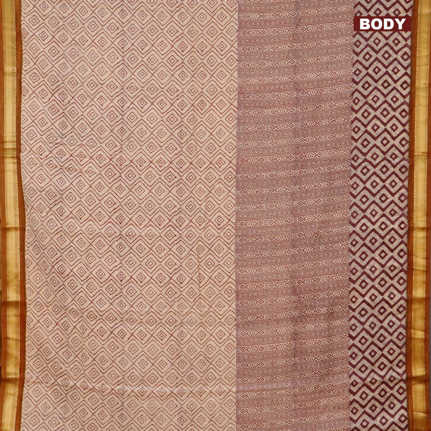 Malai silk saree beige maroon and dark mustard with allover prints and zari woven border