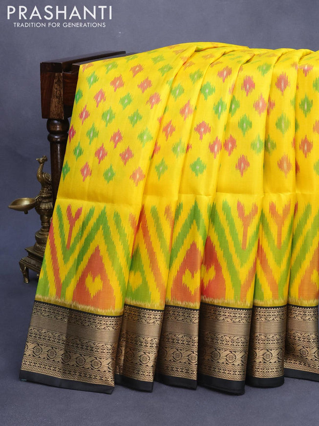 Ikat soft silk saree yellow and black with allover ikat weaves and zari woven border