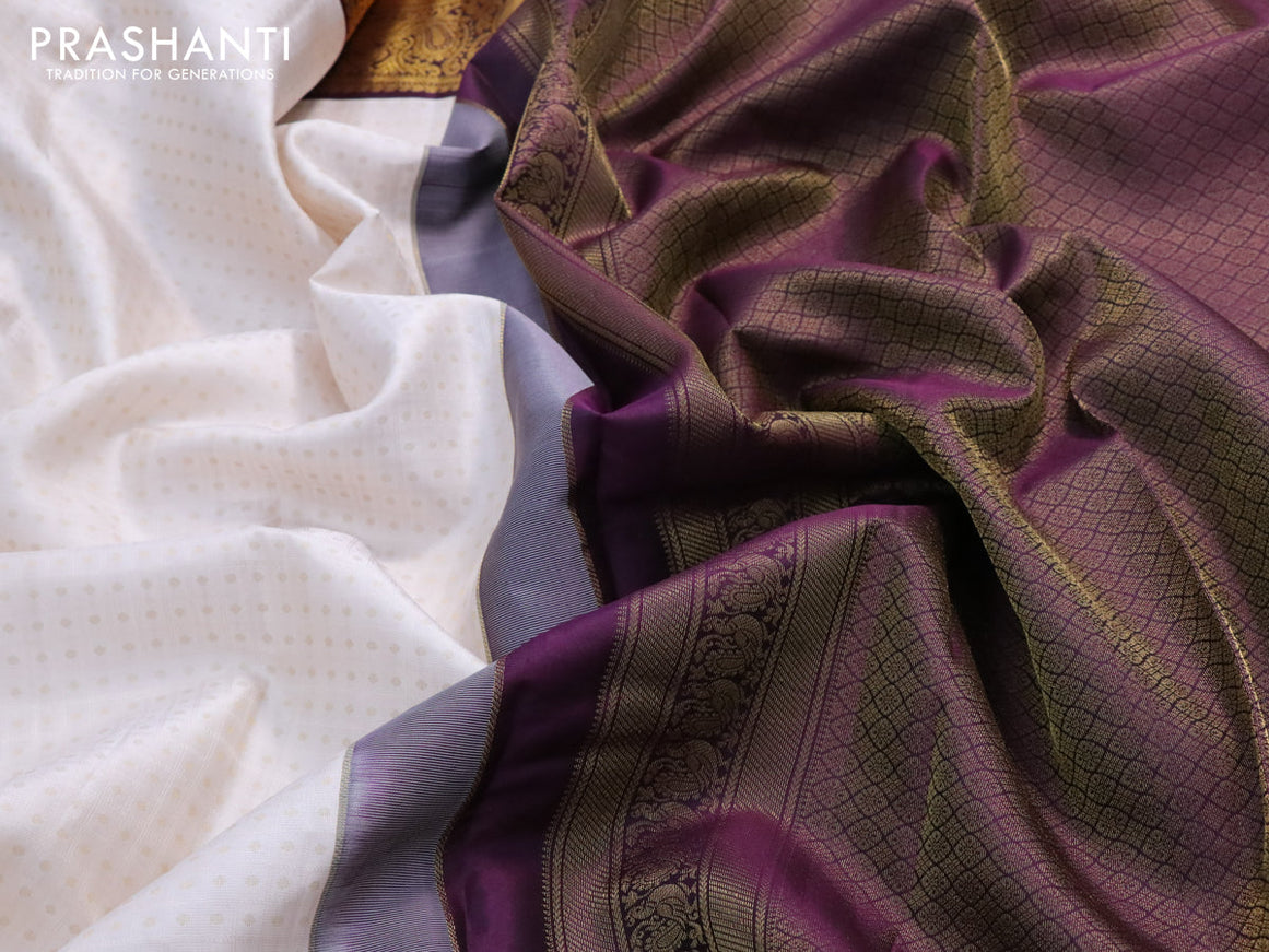 Pure kanjivaram silk saree cream and wine shade with allover self emboss & 1000 buttas and annam zari woven border