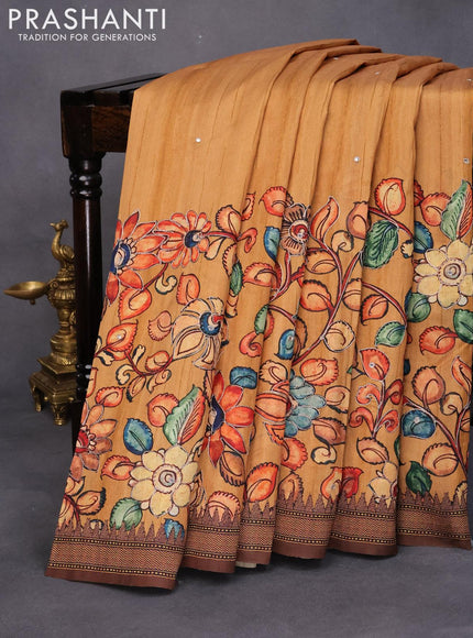 Semi tussar saree dark mustard and brown with kalamkari prints & mirror embroidery work and vidarbha style border