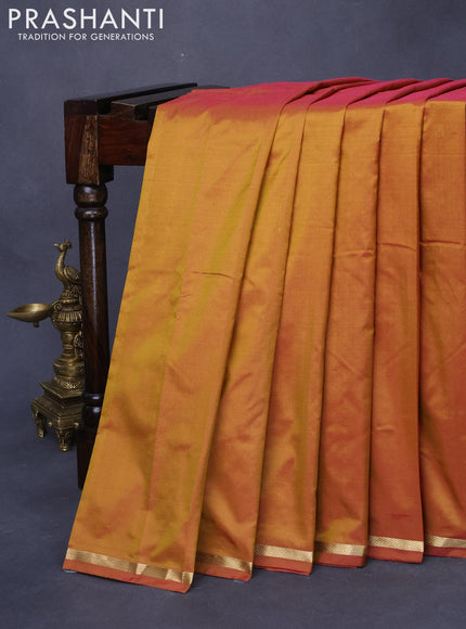 Kanjivaram silk saree dual shade of mustard yellow with plain body and small zari woven border