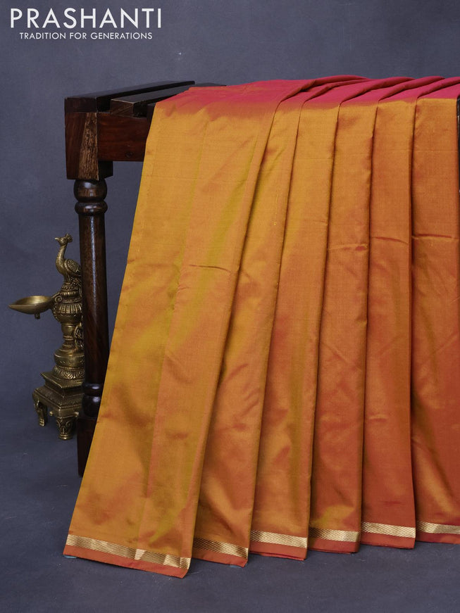 Kanjivaram silk saree dual shade of mustard yellow with plain body and small zari woven border