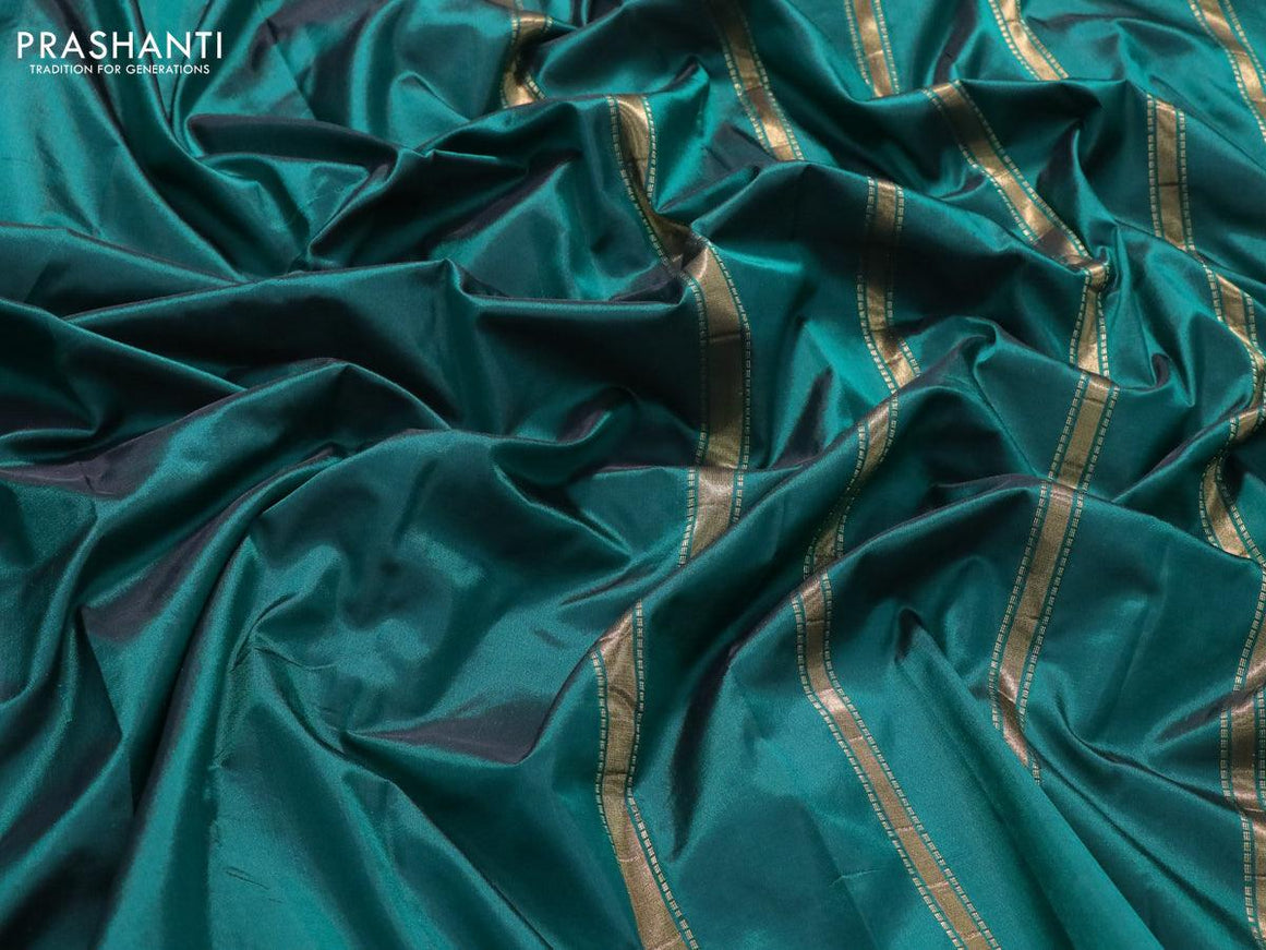 Kanjivaram silk saree green with plain body and small zari woven border