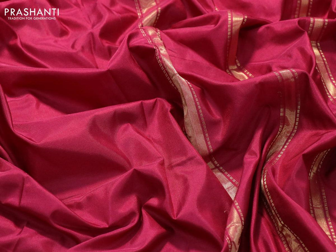 Kanjivaram silk saree dark pink with plain body and small zari woven border