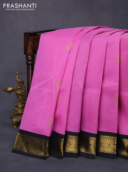 Silk cotton saree light pink and black with paecock zari woven buttas and peacock zari woven korvai border