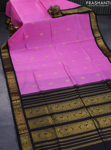 Silk cotton saree light pink and black with paecock zari woven buttas and peacock zari woven korvai border