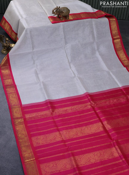 Silk cotton saree pastel grey and pink with plain body and annam zari woven border