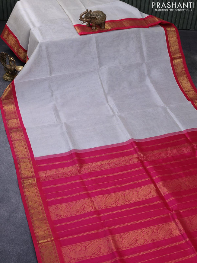 Silk cotton saree pastel grey and pink with plain body and annam zari woven border