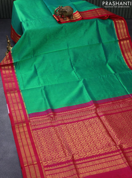 Kuppadam silk cotton saree green and pink with plain body and rudhraksha zari woven border