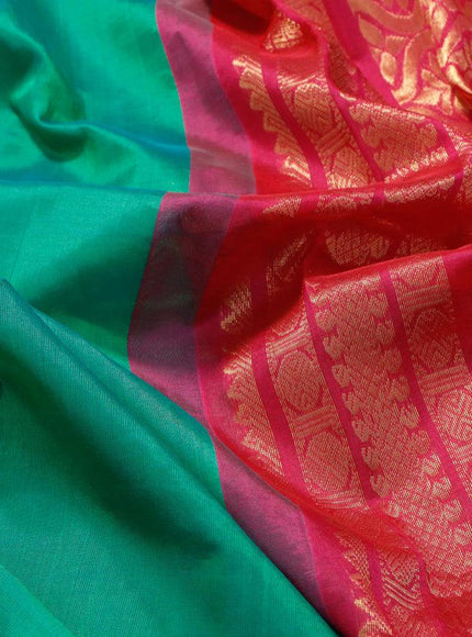 Kuppadam silk cotton saree green and pink with plain body and rudhraksha zari woven border