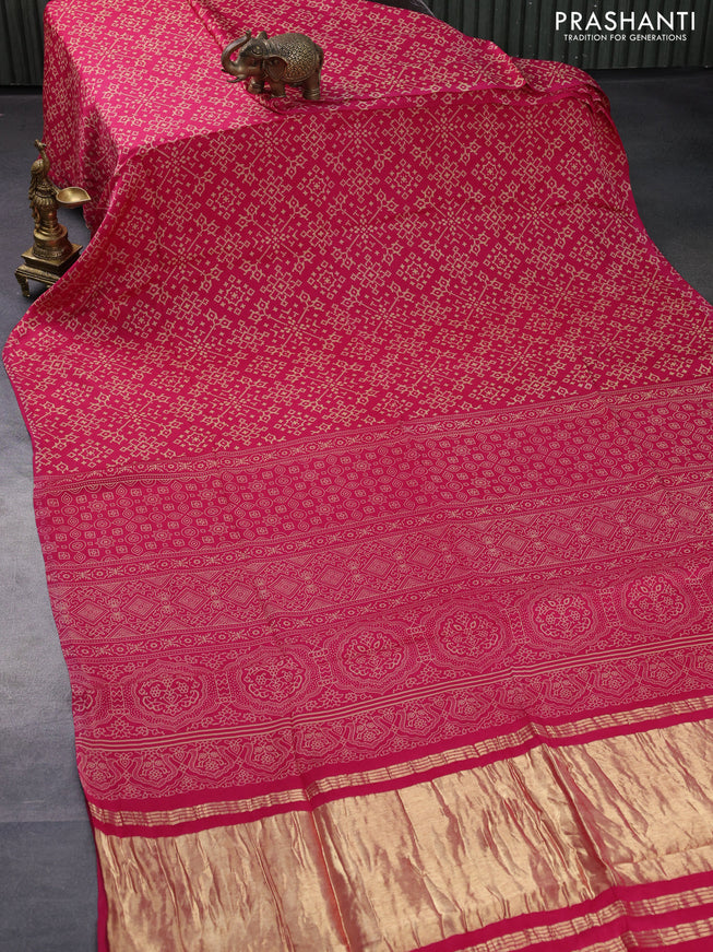 Modal silk saree pink with allover ikat prints and ajrakh printed pallu