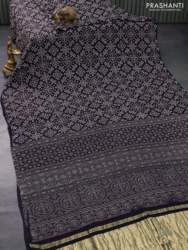 Modal silk saree navy blue with allover ikat prints and ajrakh printed pallu